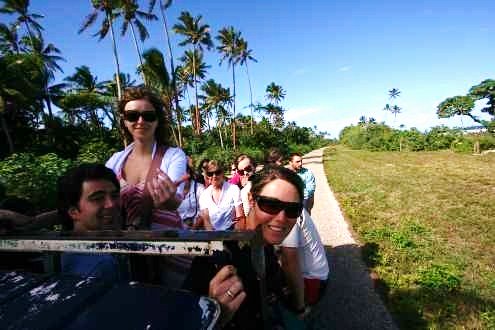 people in a truck on tour